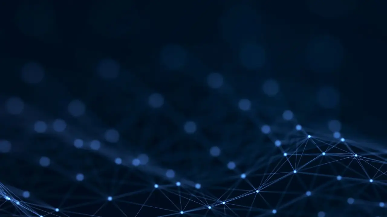 A sleek, modern product on a dark, moody background, illuminated by a red light.